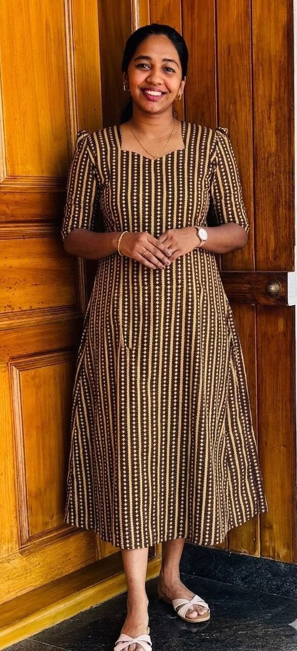 WhatsApp Image 2026-04-01 at 1.28.14 PM A Line Frock Yellow-Brown - Image 1